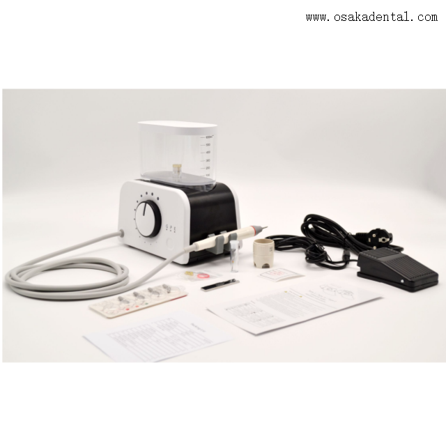 Détartreur dentaire avec pièce à main et bouteille à LED