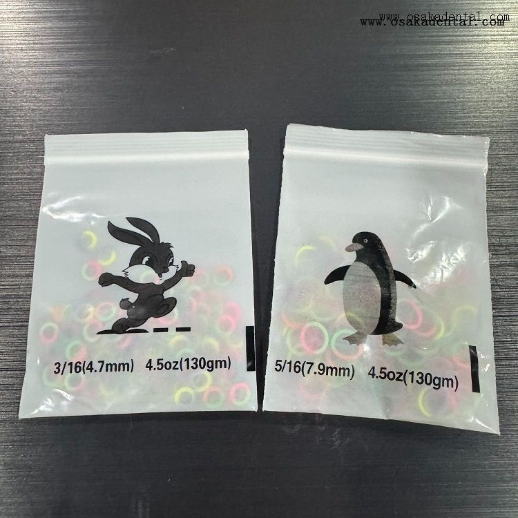 Joints toriques élastomères orthodontiques dentaires Double couleur pour bandes de caoutchouc pour accolades