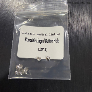 Trou de bouton lingual collé orthodontique dentaire