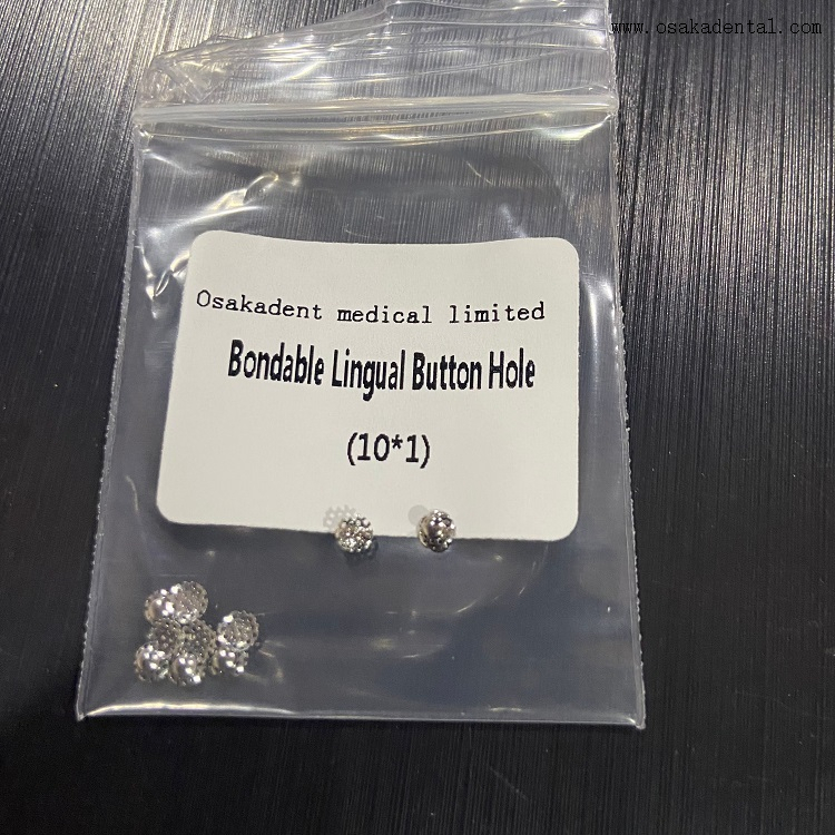 Trou de bouton lingual collé orthodontique dentaire