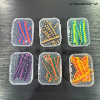 Attache de ligature dentaire orthodontique double couleur