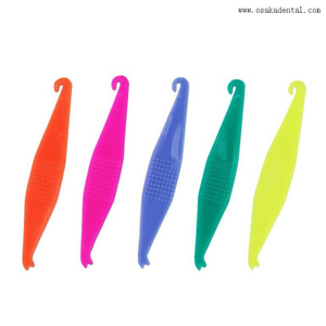 Placeur élastique coloré dentaire d'accessoires orthodontiques dentaires