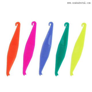 Placeur élastique coloré dentaire d'accessoires orthodontiques dentaires