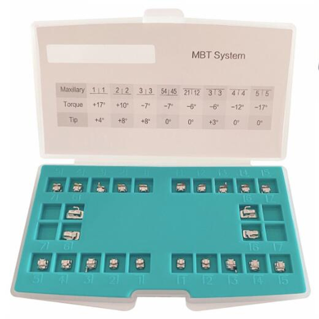 Support métallique orthodontique dentaire auto-ligant