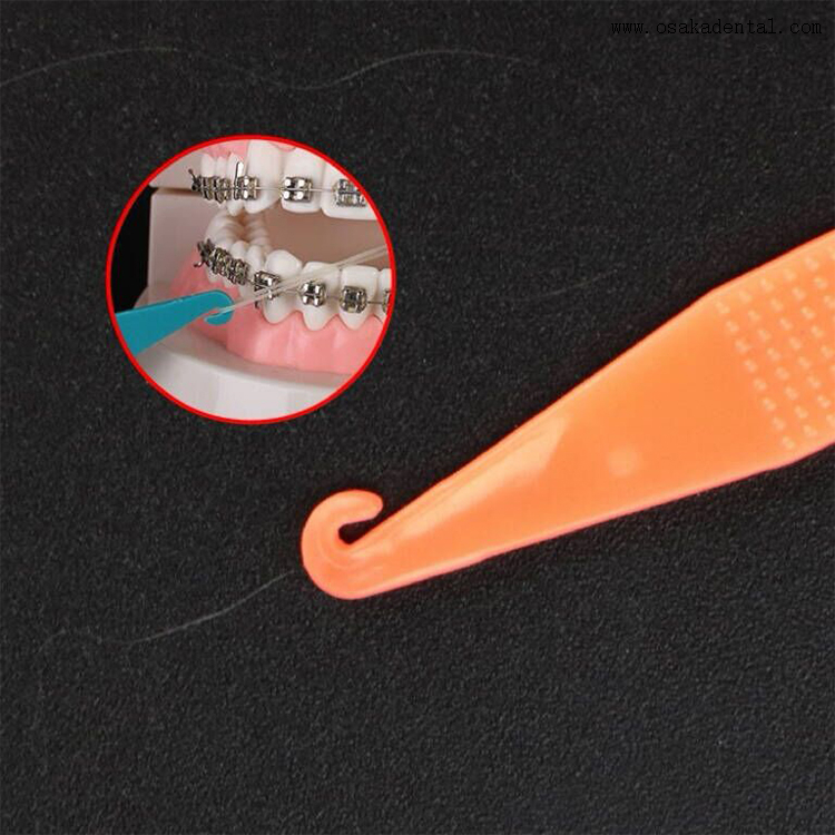 Placeur élastique coloré dentaire d'accessoires orthodontiques dentaires