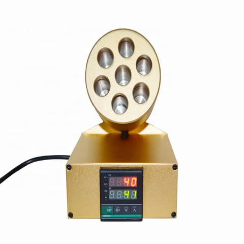 Réchauffeur de résine pour chauffer le matériau en résine